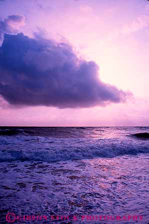 Stock Photo #12761: keywords - climate cloud clouds coast coastal mood moody natural nature ocean pink purple rough sea seascape seascapes storm surf turbulence turbulent vert water wave waves weather