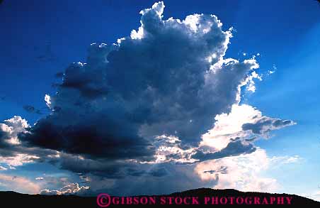 Stock Photo #12795: keywords -  air atmosphere big climate cloud clouds condensation condense condensed dark dense heavy horz massive moisture nature sky storm sunlight threaten threatening thunderhead vapor water weather