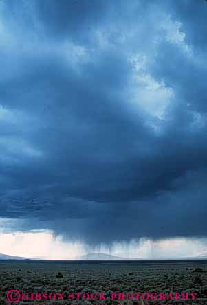 Stock Photo #6985: keywords - atmosphere atmospheric climate cloud clouds condensate condensation condense condensed condensing cool cooling dark desert environment float floating floats fog mexico moisture mood moody nature new rain raining rains shower showers sky skyward storm storms stormy suspend suspended thunder thundercloud vapor vert water weather