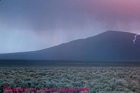 Stock Photo #6988: keywords -  atmosphere atmospheric climate cloud clouds condensate condensation condense condensed condensing cool cooling dark desert environment float floating floats fog horz mexico moisture mood moody nature new rain raining rains shower showers sky skyward storm storms stormy suspend suspended thunder thundercloud vapor water weather