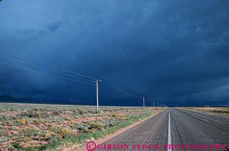 Stock Photo #6989: keywords -  atmosphere atmospheric climate cloud clouds condensate condensation condense condensed condensing cool cooling dark drive environment float floating floats fog highway horz landscape mexico moisture mood moody nature new road route rural sky skyward storm storms stormy street suspend suspended threatening thunder thundercloud vapor water weather