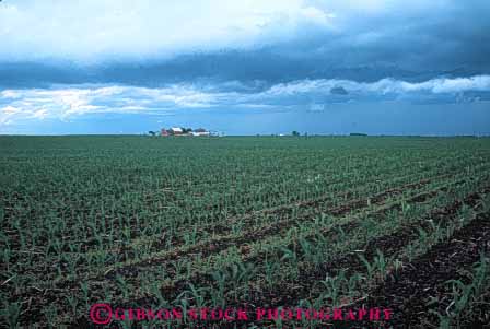 Stock Photo #6992: keywords -  agriculture atmosphere atmospheric building buildings climate cloud clouds condensate condensation condense condensed condensing cool cooling countryside dark environment farm farming farms field float floating floats fog horz iowa moisture mood moody nature rural sky skyward storm storms stormy suspend suspended thunder thundercloud vapor water weather