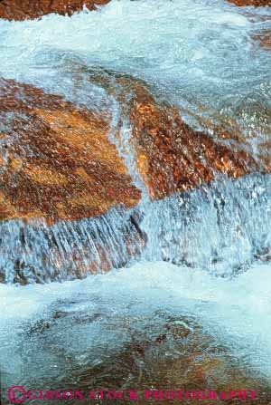 Stock Photo #7011: keywords -  blur blurred cascade cascades churn churning churns clean clear creek environment fall falling falls flow flowing flows fresh freshwater gravity motion move moving nature pour pours pure rapid rapids river sparkle sparkling splash stream vert water