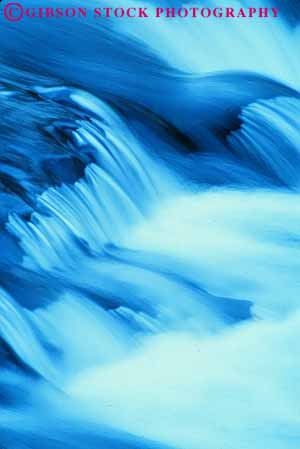 Stock Photo #7014: keywords - blur blurred cascade cascades churn churning churns clean clear creek environment exposure fall falling falls flow flowing flows fresh freshwater gravity long motion move moving nature pour pours pure rapid rapids river sparkle sparkling splash stream vert water