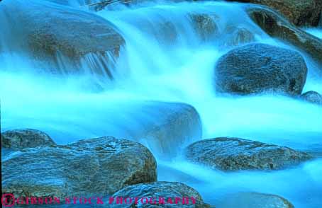 Stock Photo #7023: keywords - blur blurred cascade cascades churn churning churns clean clear creek ebnvironment exposure fall falling falls flow flowing flows fresh freshwater gravity horz long motion move moving nature pour pours pure rapid rapids river sparkle sparkling splash stream water