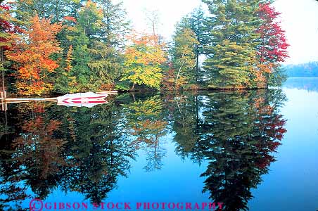 Stock Photo #13862: keywords -  autmun bilateral boat boats calm color england fall flat foliage horz lake lakes landscape ludlow mirror mirrorlike mirrors motorboat nature new peaceful quiet reflect reflecting reflection reflects region rescue scenery scenic season serene still tree trees vermont water wilderness