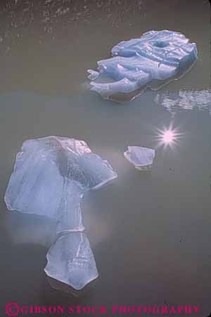 Stock Photo #7055: keywords - abstract abstraction abstracts burst chill chilly cold environment float floating freeze freezing frozen icebergs icy in islands lake nature season snow sun vert water wet winter