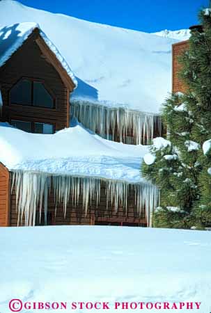 Stock Photo #7056: keywords - chill chilly cold environment eve freeze freezing frozen hanging home homes house ice icicle icicles icy nature season snow vert water wet winter