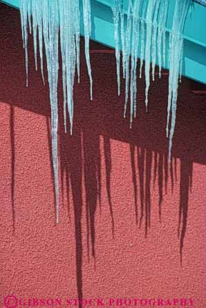 Stock Photo #7058: keywords -  aedge chill chilly cold environment freeze freezing frozen hang home homes house ice icicle icicles icy nature roof season snow vert water wet winter