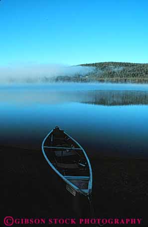 Stock Photo #7066: keywords - abstract abstraction abstracts canoe chill chilly climate cloud clouds condense condensed condenses condensing cool dew environment fog foggy freshwater gray humid humidity lake mist misty moisture mood moody nature reduced vapor vert visibility water weather wet