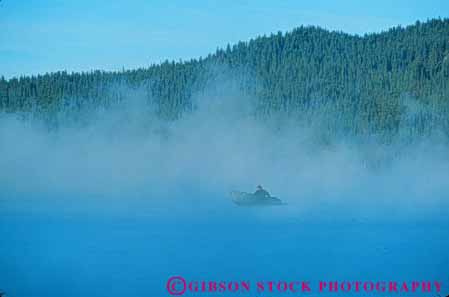 Stock Photo #7068: keywords -  abstract abstraction abstracts boater boating chill chilly climate cloud clouds condense condensed condenses condensing cool dew environment fisherman fishing fog foggy freshwater gray horz humid humidity lake mist misty moisture mood moody motorboat nature navigate outboard reduced vapor visibility water weather wet