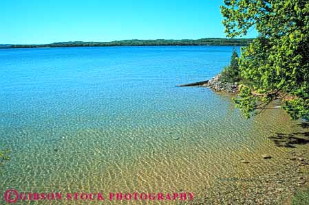 Stock Photo #7093: keywords -  beautiful beauty calm clean clear environment freshwater horz lake landscape leelanau michigan nature peaceful pond pretty pristine pure quiet remote runoff scenery scenic shallow shore solitude still summer water wet wild wilderness