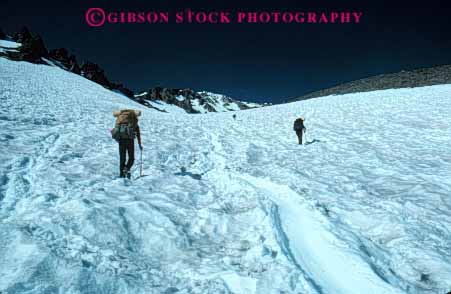 Stock Photo #5513: keywords -  adventure altitude backpack backpacking bare california campers camping cascade challenge climb climbers climbing cold effort elevated elevation expedition explore exploring group hike hikers hiking hill horz landscape mount mountain mountaineer mountaineering mountaineers mountains mt mt. outdoor outdoors outside path rock scene scenic shasta snow snowfield summer team trek up walk