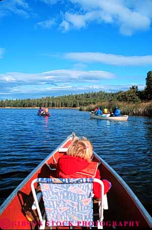 Stock Photo #5514: keywords -  adventure ahjumawi boat boaters boating california calm canoe canoeing exercise expedition explore exploring float flotation girl group jacket lake landscape life outdoor outdoors outside paddle paddlers paddling park recreaction released scene scenic sport state summer team trek vert vest water wilderness