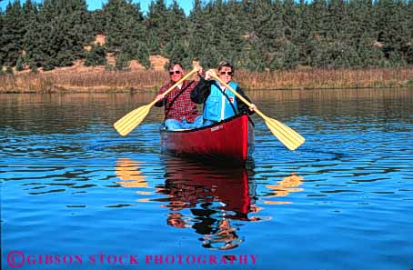 Stock Photo #5516: keywords - adventure ahjumawi boat boaters boating california calm canoe canoeing couple elderly exercise expedition explore exploring float floating flotation group horz husband lake landscape mature old outdoor outdoors outside paddle paddlers paddling park peaceful quiet recreation reflection released scene scenic senior serene share sport state summer team together trek vacation water wilderness