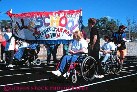 Stock Photo #5530: keywords -  activity and athlete athletic child children compete competing competition competitor contest disability disabled disadvantage disadvantaged educate educating education elementary entrance event field group handicap handicapped horz need needs olympic olympics parade recreation retarded school special sport student students team track youth