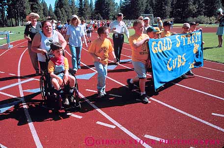 Stock Photo #12309: keywords - annual california challenge challenged child children disabilities disability disable education entrance event fun group groups handicap handicapped horz mainstream mainstreaming need needs olympics parade parades play playing recreation retard retarded special sport sports weed