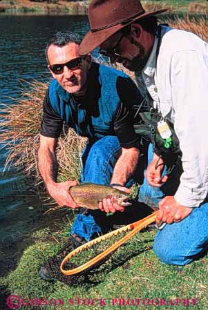 Stock Photo #5542: keywords -  achieve achievement catch caught fish fisherman fishermen fishing lake land outdoor outdoors outside pond recreation released sport success successful summer trout vert water