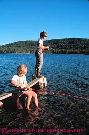 Stock Photo #5543: keywords -  americana boy brother calm catch child children dock fish fisherman fishermen fishing girl lake outdoor outdoors outside quiet recreation released romantic safe secure share sibling sister sport summer together vacation vert water youth youths