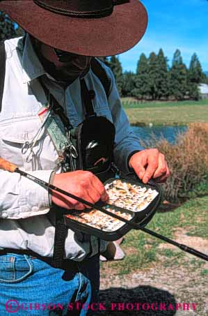 Stock Photo #5545: keywords -  bait catch choice choose equipment fish fisherman fishermen fishing flies fly flys gear lure outdoor outdoors outside recreation released sport summer tackle vert water