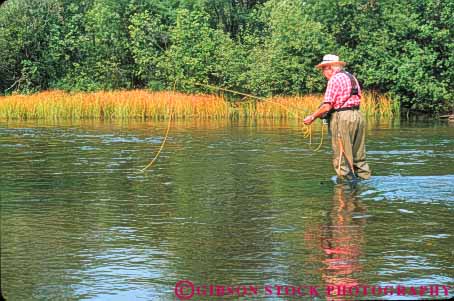 Stock Photo #10935: keywords -  alone au citizen citizens elderly fish fisherman fishermen fishes fishing fly for horz man mature men michigan old peaceful pole quiet recreation released river rivers sable senior serene solitary solitude sport sports stream streams summer trout wadding wade