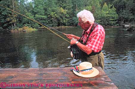 Stock Photo #10936: keywords -  alone au citizen citizens elderly fish fisherman fishermen fishes fishing fly for horz man mature men michigan old peaceful pole quiet recreation released river rivers sable senior serene solitary solitude sport sports stream streams summer trout wadding wade