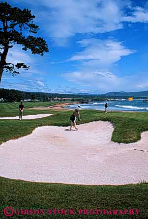 Stock Photo #5559: keywords -  beach ca california carmel club coast country course golf golfer golfers golfing grass green landscape lawn ocean outdoor outdoors outside pebble practice recreation resort sand scenic skill sport summer surf trap vert