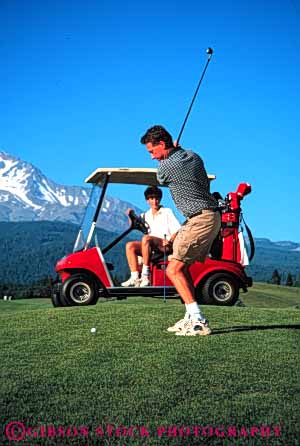Stock Photo #5560: keywords -  battery ca california cart club country couple course golf golfer golfers golfing grass green husband lawn man mount mt mt. outdoor outdoors outside power practice recreation released resort share shasta skill sport spouse summer together vehicle vert wife woman