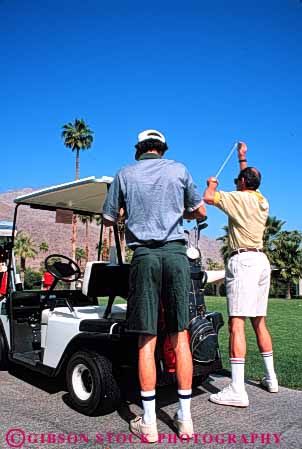 Stock Photo #5561: keywords - ca california cart club country course desert golf golfer golfers golfing grass green lawn outdoor outdoors outside palm practice recreation resort skill sport springs summer vacation vert