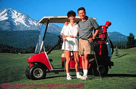 Stock Photo #5565: keywords -  affection california club country couple course embrace golf golfer golfers golfing grass green happy horz lawn mt outdoor outdoors outside pause portrait pose practice recreation relax released resort share shasta skill sport summer team together travel vacation