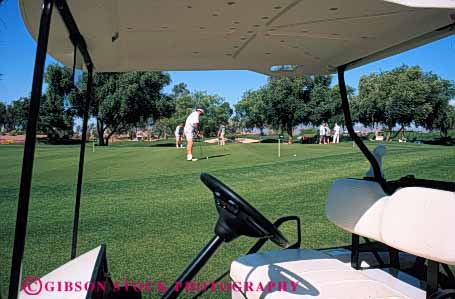 Stock Photo #5567: keywords -  arizona cart club country course gainey golf golfer golfers golfing grass green horz hyatt lawn outdoor outdoors outside practice ranch recreation resort scottsdale skill sport summer travel vacation