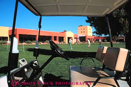 Stock Photo #5571: keywords -  cart club country course golf golfer golfers golfing grass green horz las lawn nevada nv outdoor outdoors outside practice recreation sahara skill sport summer vegas
