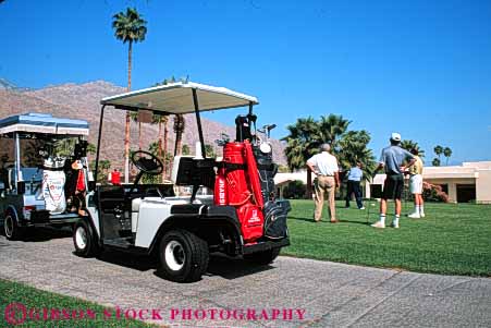 Stock Photo #5572: keywords -  ca california cart club country course golf golfer golfers golfing grass green horz lawn men outdoor outdoors outside palm practice recreation resort skill sport springs summer vacation