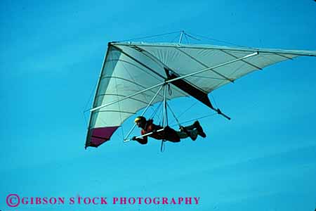 Stock Photo #5577: keywords - air alone danger drift equipment fall flight float floating fly flyer flying glide glider gliders glides gliding hang hangglide hangglider hanggliders hanggliding horz lift lifted lifting lifts machine one peaceful private quiet recreation ride risk sail solitary solitude sport suspend suspended thermal wind wing