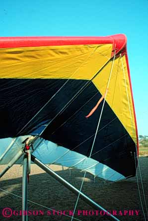 Stock Photo #5578: keywords - air danger drift engineer engineering equipment fabric fall flight float floating fly flyer flying glide glider gliders glides gliding hang hangglide hangglider hanggliders hanggliding lift lifted lifting lifts lightweight line lines machine metal recreation ride risk sail sport suspend suspended synthetic tension thermal tube tubular vert wind wing
