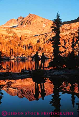 Stock Photo #5581: keywords -  ca california conditioning couple dusk exercise explore fit fitness hike hiking lake move national ottoway outdoor outdoors outside park physical physically reflection released share silhouette sunset together two vert walk walker walking water workout yosemite