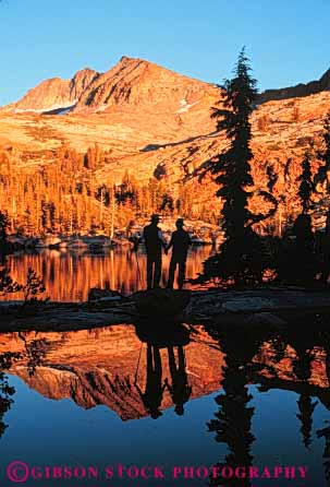 Stock Photo #5581: keywords -  ca california conditioning couple dusk exercise explore fit fitness hike hiking lake move national ottoway outdoor outdoors outside park physical physically reflection released share silhouette sunset together two vert walk walker walking water workout yosemite