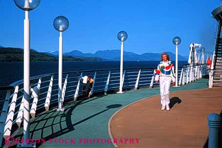 Stock Photo #5590: keywords - along calm cruise elderly exercise exercising explore female fit fitness he hiking horz invigorate invigorating mature move of outdoor outdoors outside peaceful physical physically quiet released rhapsody seas senior ship solitary solitude stroll walk walker walking woman workout