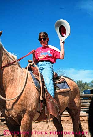 Stock Photo #5598: keywords - animal girl horse horseback horses hot large mammal outdoor outdoors outside recreation released ride rider riding sport teen teenage teenager teenagers trained vert wave west western woman young