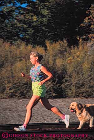 Stock Photo #5604: keywords - action activity animal condition conditioning dog endurance endure exercise fit fitness health jog jogger joggers jogging motion move movement outdoor outdoors outside pet physical physically railroad ran recreation released run runner runners running speed sport strength summer track vert vigorous with woman workout