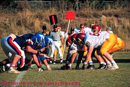 Stock Photo #5648: keywords - action ball college color colorful compete competing competition competitive competitor contact coordinate coordination defense defensive field fit fitness football game horz injury line loose looser man men move movement offense offensive oppose opposition pass physical plan practice rule rules run score scrimmage sport sports tackle team throw violent win winner