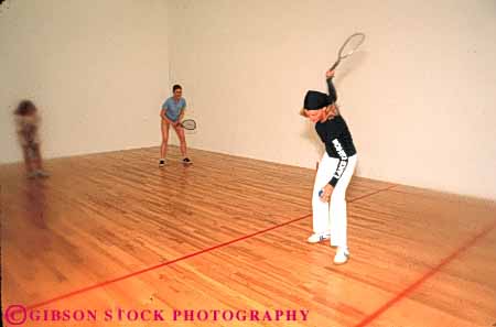 Stock Photo #5656: keywords -  action activity ball compete competing competition competitive competitor court edges female group gym gymnasium horz indoor indoors loose photowsport play racket racketball recreation soft sports win woman women young