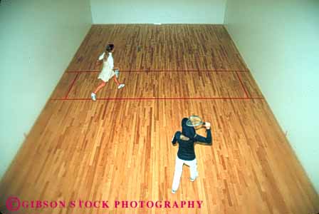 Stock Photo #5657: keywords -  action activity ball compete competing competition competitive competitor court edges female group gym gymnasium horz indoor indoors loose photowsport play racket racketball recreation soft sports win woman women young