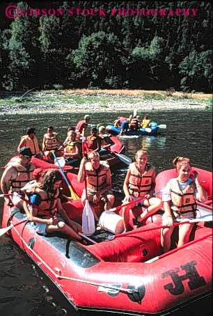 Stock Photo #5663: keywords -  adolescence adolescent adolescents adventure boat boater boating california child children class expedition field float group high inflatable inflate klamath material orange outdoor outdoors outside paddle paddler paddlers paddling plastic raft rafting recreation river rubber school sport sports stream summer synthetic team teen teenager teenagers teens thrill travel trip vacation vert water youth youths