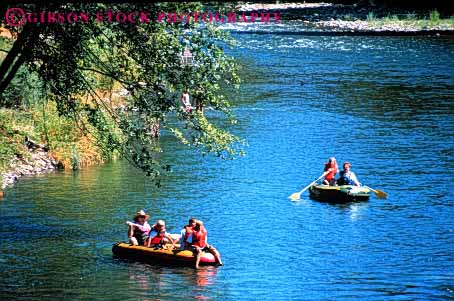 Stock Photo #5666: keywords -  adventure applegate boat boater boating calm drift expedition families family float floating group horz inflatable inflate material oregon outdoor outdoors outside paddle paddler paddlers paddling peaceful plastic play quiet raft rafting recreation relax river rubber sport sports stream summer synthetic team thrill travel trip vacation water