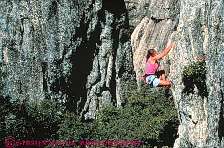 Stock Photo #3542: keywords -  alone cliff climber dangerous daring environment fall gravity horz outdoor released risk rock safety skill sport sports strength thrill vertical woman