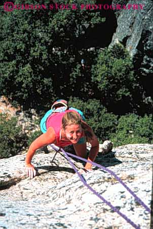 Stock Photo #5674: keywords - achieve achievement achiever achieving agile agility along ascend brave caution challenge cliff climb climber climbing commitment confidence danger ecosport edge elevate elevated endurance fall female geology hang injury line outdoor outdoors outside peaceful potential private protection quiet recreation released risk rock rockclimb rope scare scary solitary solitude solo sport sports steep strength strong summer support up upward vert woman women
