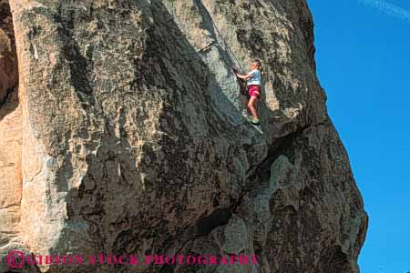 Stock Photo #5682: keywords -  achieve achievement achiever achieving agile agility along ascend brave califoirnia caution challenge cliff climb climber climbing commitment confidence danger desert ecosport edge elevate elevated endurance fall female geology hang horz injury joshua line national outdoor outdoors outside park parks peaceful potential private protection public quiet recreation released risk rock rockclimb rope scare scary solitary solitude solo sport sports steep strength strong summer support tree up upward woman women