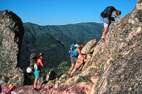 Stock Photo #5683: keywords -  achieve achievement achiever achieving agile agility along ascend ascending brave caution challenge cliff climb climber climbing commitment confidence danger ecosport edge elevate elevated endurance fall geology group hang horz injury line outdoor outdoors outside peaceful potential private protection quiet recreation released risk rock rockclimb rope scare scary solitary solitude solo sport sports steep strength strong summer support team three up upward woman women