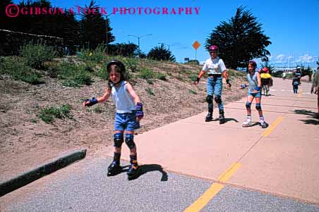 Stock Photo #5691: keywords - adolescence adolescent adolescents blade boot boots california child children daughter equipment fall family feet female foot fun gilder glide gliding gravity group horz leg legs monterey mother move movement outdoor outdoors outside parent parents play practice protect protection recreation roll roller rollerblade rollerblader rollerblading rollerskater rollerskating rolling safety share shoe shoes single skate skill sport sports summer team together wheel wheels with woman women youth youths